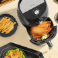 Preview: Silikonform für Heißluftfritteuse in Grillpfannen-Design mit Griffen - Ø 20 cm Airfryer Einsatz rund BPA-frei, antihaft spülmaschinenfest, hitzebeständig bis 230 °C - Air Fryer Zubehör schwarz